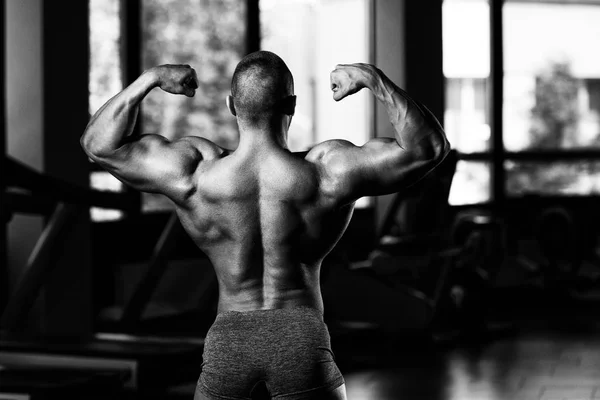 Homens musculares está batendo traseiro duplo bip dose — Fotografia de Stock