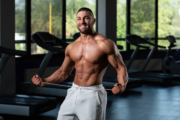 Healthy Young Man Flexing Muscles — Stock Photo, Image