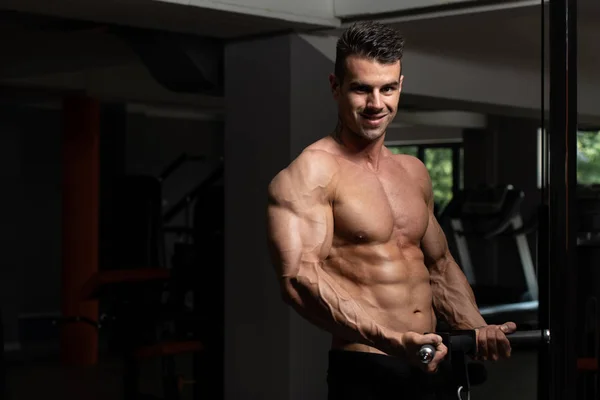 Man Exercising Biceps In The Gym — Stock Photo, Image