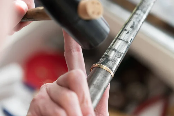 Goldsmith Working On Unfinished Ring With His Hammer — Stock Photo, Image