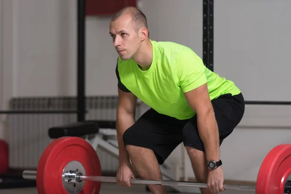 Soffa Gör Tung Styrketräning För Ryggen Med Skivstång Gym — Stockfoto