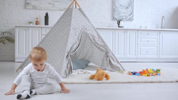 Excited Toddler Boy Jumping Ball Running Home Baby Wigwam — Stock Video