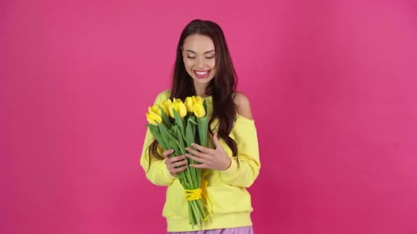 Studio Shoot Happy Young Woman Smelling Yellow Tulips Dancing Crimson — Stock Video