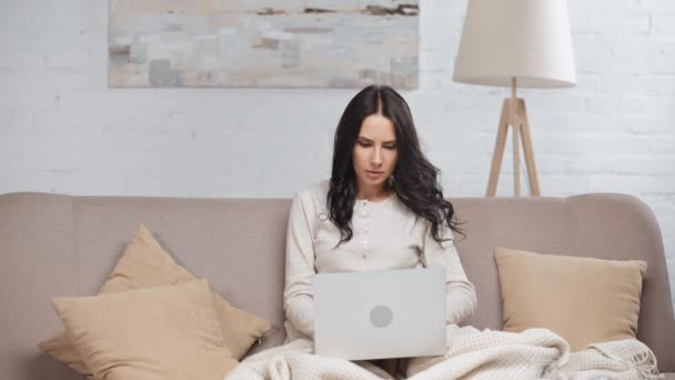 Sick Brunette Blogger Using Laptop Coughing Taking Tissue Lying Sofa — Stock Video