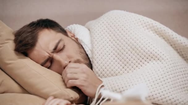Handsome Sick Man Lying Bed Coughing Taking Tissue Blowing Nose — Stock Video