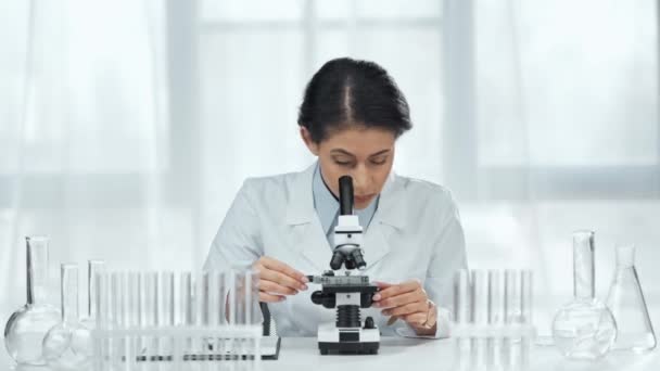African American Scientist Looking Sample Microscope Lab — Stock Video