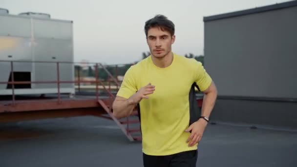 Handsome Sportsman Yellow Sportswear Running Rooftop — Stock Video