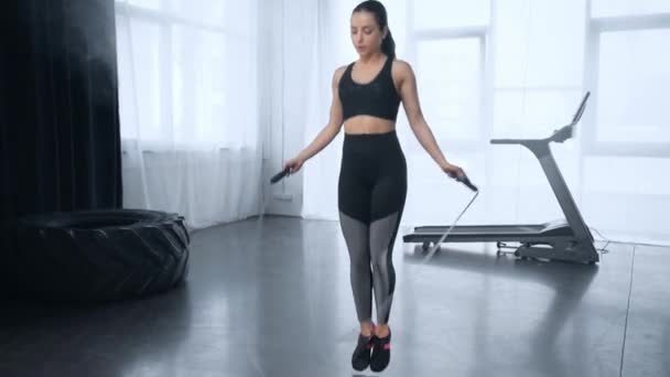 Beautiful Young Sportswoman Training Skipping Rope Sports Center — Stock Video
