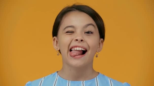 Funny Preteen Child Grimacing Isolated Yellow — Stock Video