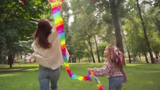 Back View Mother Daughter Running Kite Park — Stock Video