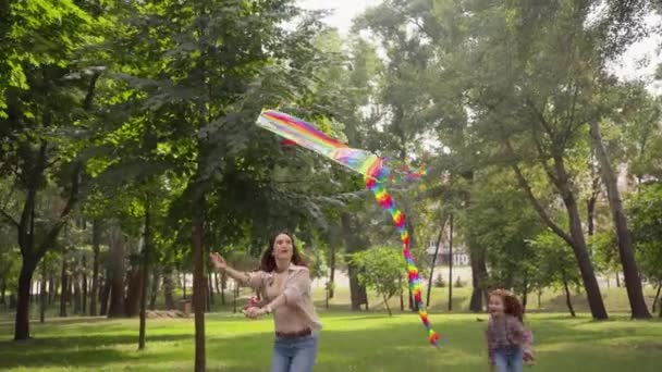 Happy Mother Daughter Running Colorful Kite Park — Stock Video