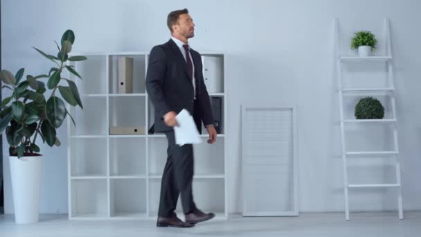 Mature Businessman Dancing Papers Modern Office — Stock Video