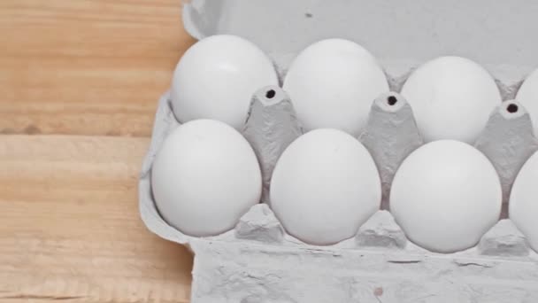 Eggs Cardboard Container Wooden Surface — Stock Video