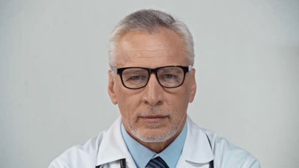 Middle Aged Doctor Glasses Touching Chin Looking Camera — Stock Video
