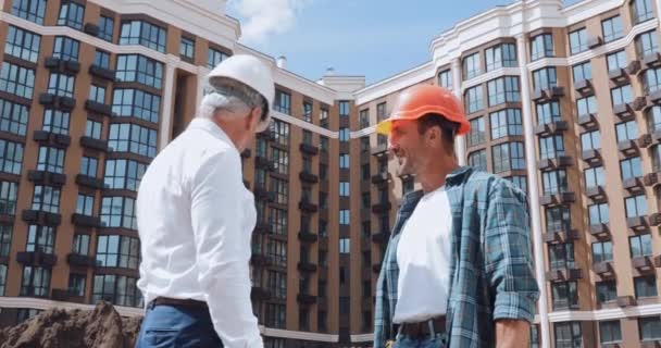 Engineer Builder Talking While Meeting Construction Site — Stock Video