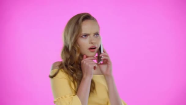 Young Woman Talking Cellphone Isolated Pink — Stock Video