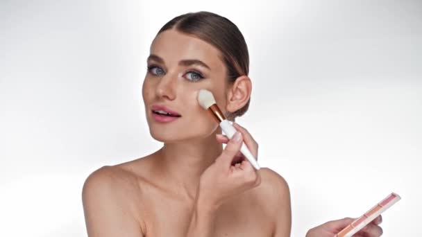 Young Adult Woman Applying Face Powder Cosmetic Brush Cheeks White — Stock Video