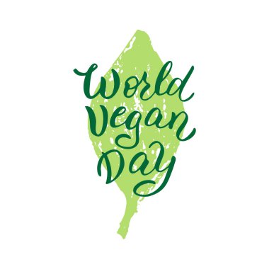 Yeşil yaprağın üzerindeki dünya vegan günü ifadesi. Vejetaryen günü tişört baskısı