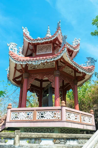 Asian building with decoration in pagoda in Nha Trang with clear sky