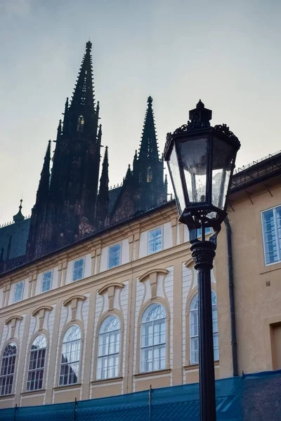 Old street lamp and roof of the cathedral in Prague in the morning — Stock Photo, Image