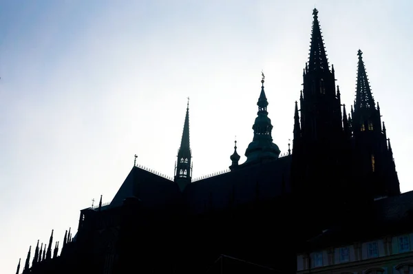 Black silhouette of the cathedral against the sky in Prague in the morning — Stock Photo, Image