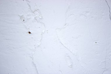 Doku, duvar, beton, arka plan olarak kullanılabilir. Çizik ve çatlaklarla dolu bir duvar parçası.