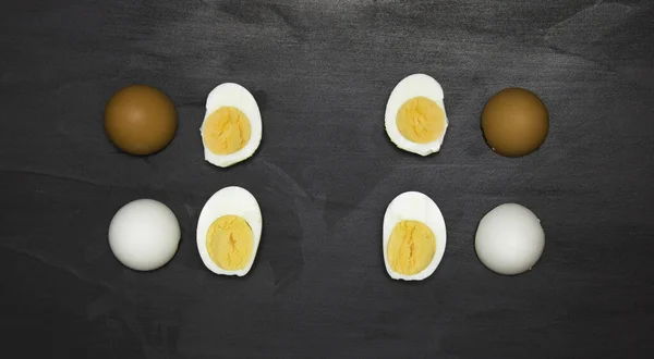 The concept of anti-racism, inside we are all the same. Support for equal rights of black people. Dark and light chicken egg and white and yolk.