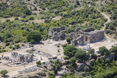 Kaunos antik kenti, Dalyan Vadisi, Türkiye. Kaunos (Latince: Caunus) Antik Karya ve Anadolu 'da, modern Dalyan kentinin birkaç km batısında, Mula Eyaleti, Türkiye.