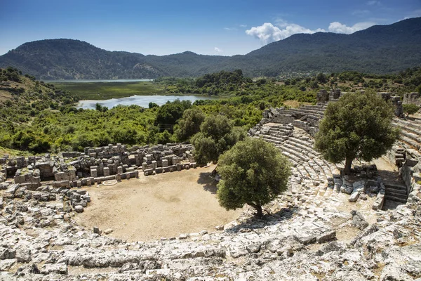 Kaunos antik kenti, Dalyan Vadisi, Türkiye. Kaunos (Latince: Caunus) Antik Karya ve Anadolu 'da, modern Dalyan kentinin birkaç km batısında, Mula Eyaleti, Türkiye.