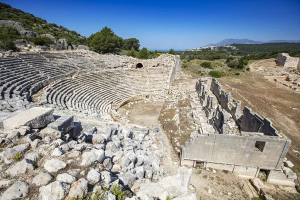 Patara (Pttra). Ruins of the ancient Lycian city Patara. Amphi-theatre and the assembly hall of Lycia public. Patara was at the Lycia (Lycian) League\'s capital. Aerial view shooting. Antalya, TURKEY