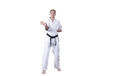 Yetişkin sporcu resmi Goju-ryu egzersizleri yapıyor..