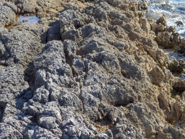 Deniz kıyısında taş dokusu