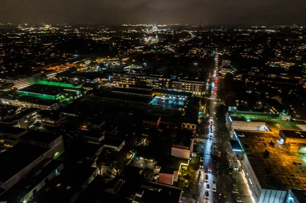 Aerial view of Hamburg at night, Germany. Christmas time. Wandsbek station. City traffic. Christmas decorations. Aerial footage. Night.