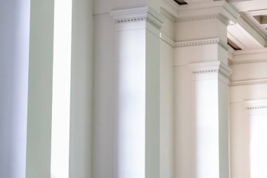 Background of interior wall with white columns in row clipart