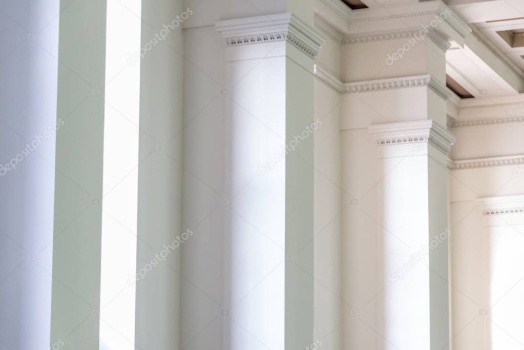 Background of interior wall with white columns in row