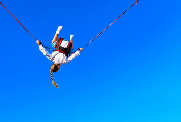 Little Girl Blue Sky Jumping Bungee Trampolin Doing Somersault Air — Stock Photo, Image