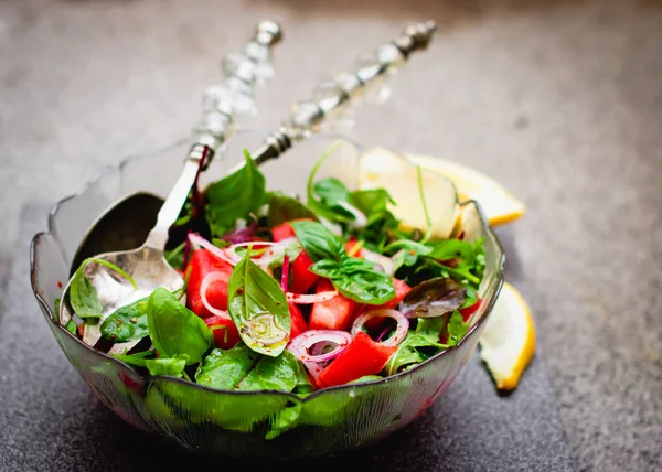 Vegan watermelon salad in a glass bowl — Stock Photo, Image