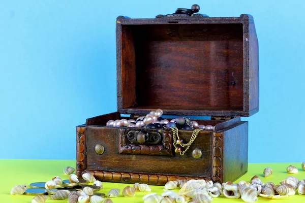 Old Wooden Chest Open Lid Filled Treasures Yellow Blue Background — Stock Photo, Image