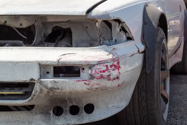 Fragment of the body of the car after the accident, Recovery and repair, traces of collision.