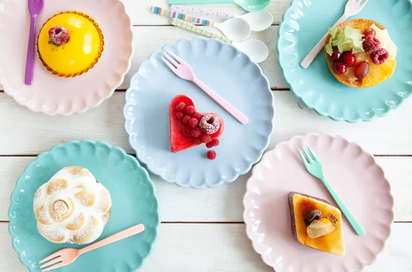 Delicious Little Cakes Pies Colorful Plates — Stock Photo, Image