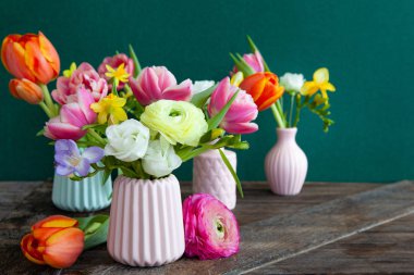 Little bouquets made from bright cheerful spring flowers