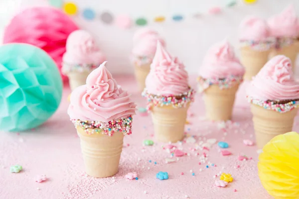 Pink soft serve ice cream with sprinkles — Stock Photo, Image