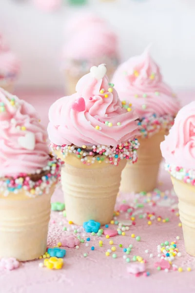Pink soft serve ice cream with sprinkles — Stock Photo, Image