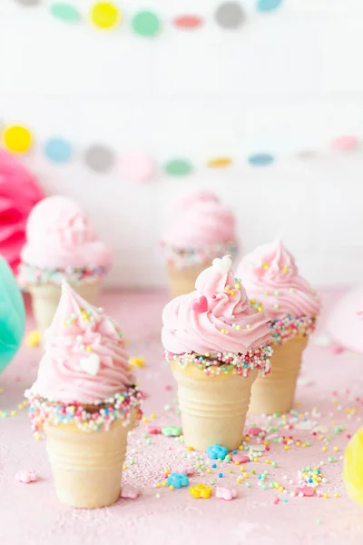 Pink soft serve ice cream with sprinkles — Stock Photo, Image