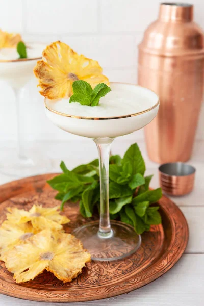 Exotic cocktail with dried pineapple