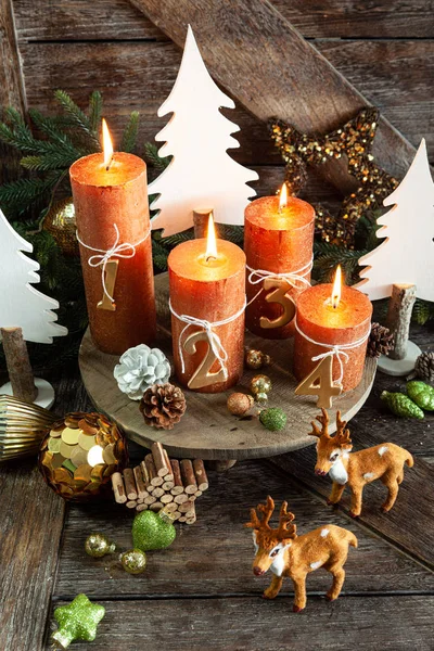 Four candles and decorations — Stock Photo, Image