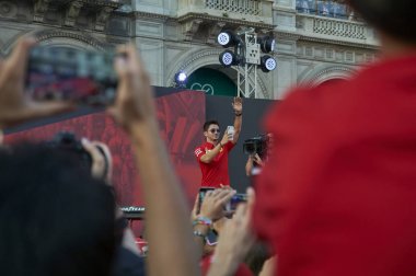 Milan, Italy - September 4th 2019: Ferrari Racing Formula One 90th Anniversary, Duomo square. Charles Leclerc clipart