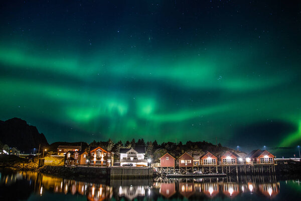Northern lights above Reine in Lofoten islands in Norway