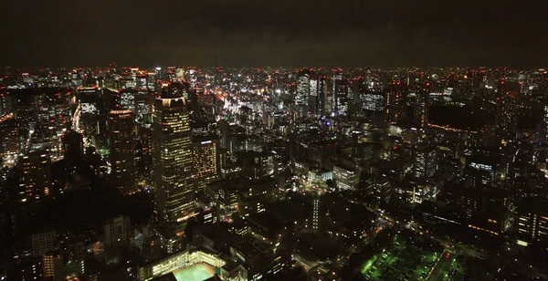Vista de rua da Torre de Tóquio à noite, no Japão — Fotografia de Stock