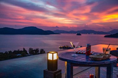 Tayland baba nest beach club Phuket gün batımı manzarası,